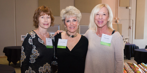 three smiling women